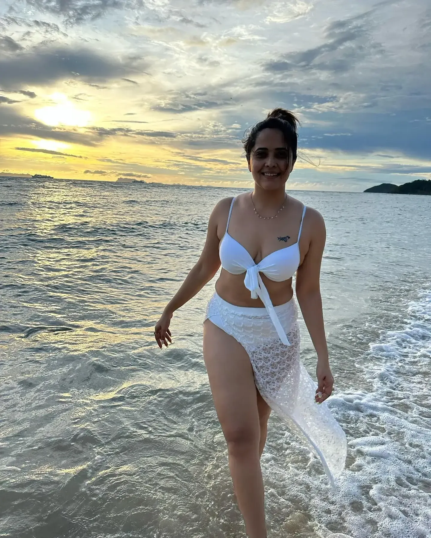Indian TV Actress Anasuya Bharadwaj Images in White Bikini
